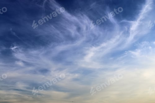 Preview: Beautiful and calming cirrus cloud formations in a deep blue summer sky