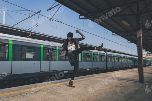 Preview: Pretty girl posing in a metro station