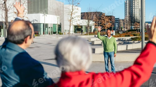 Preview: Three senior friends greeting each other in a modern city setting