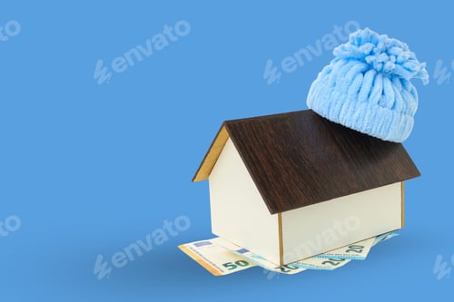 Preview: A small house wearing a knit cap symbolizes warmth and comfort