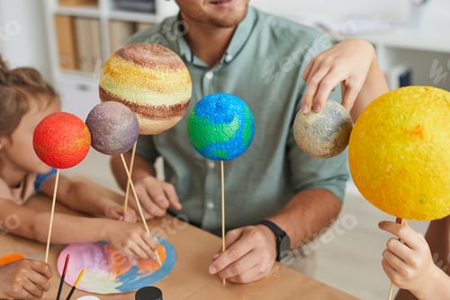 Preview: Kids Playing with Model Planets