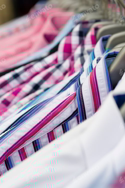 Preview: Colorful Assorted Shirts on Hangers for Retail
