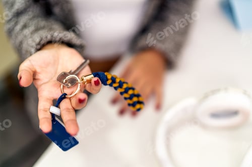 Preview: Digital nomad showing keys of airbnb apartment