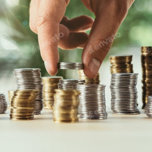 Preview: cropped view of person stacking coins on table on blurred green background