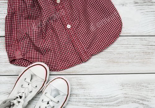 Preview: Red Checkered Shirt with White Sneakers on Wood