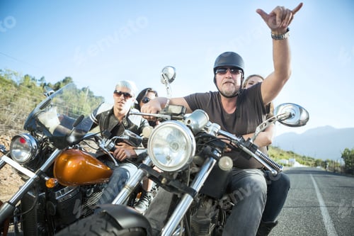 Preview: Friends riding motorcycles on open road
