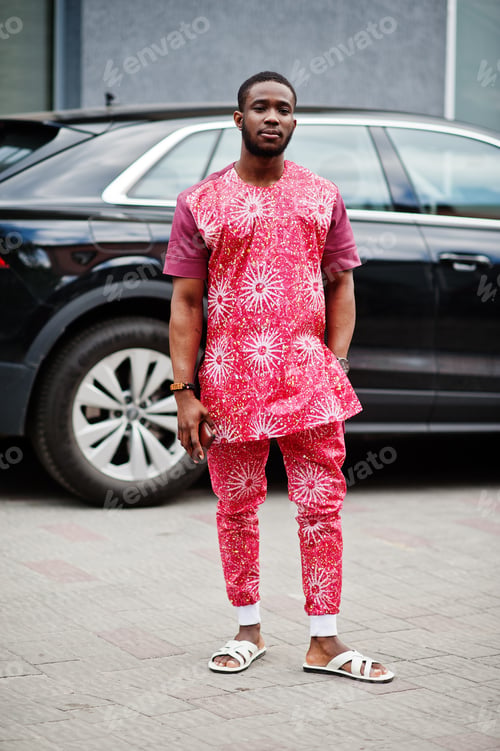 Preview: Black young man wearing african traditional clothes