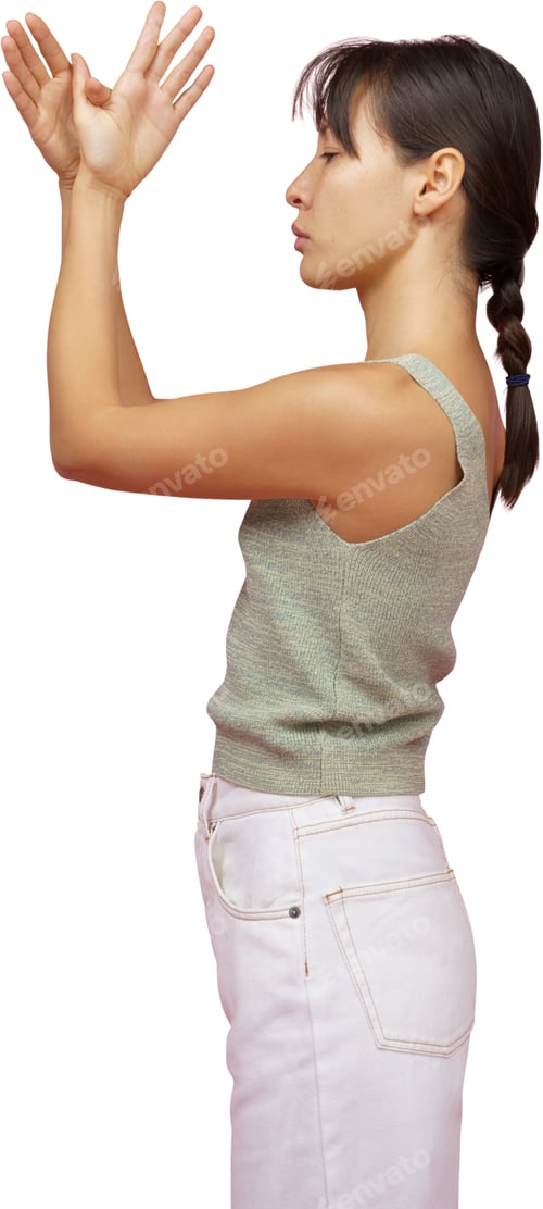 Preview: a woman in white jeans and a gray tank top holding her arms in the air