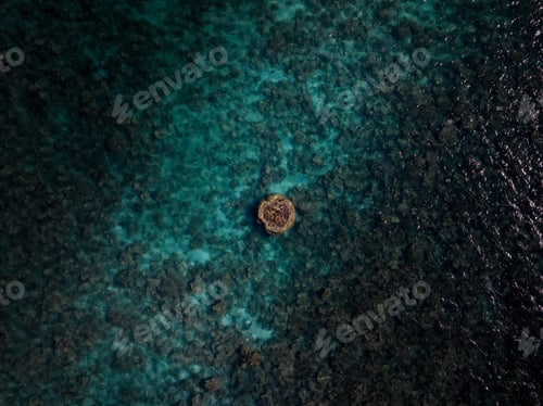 Preview: Aerial view of a solitary rock in Ningaloo coral reef, off the coast of Western Australia, Australia
