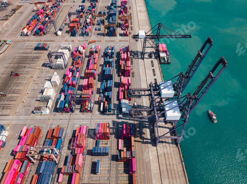 Preview: Aerial view of busy container terminal and cargo cranes