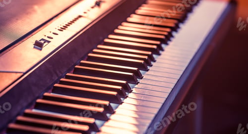 Preview: piano keys close-up, on a beautiful colored background