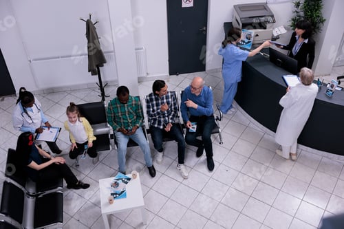 Preview: Top view of hospital reception diverse group of people waiting for next doctor appointment while
