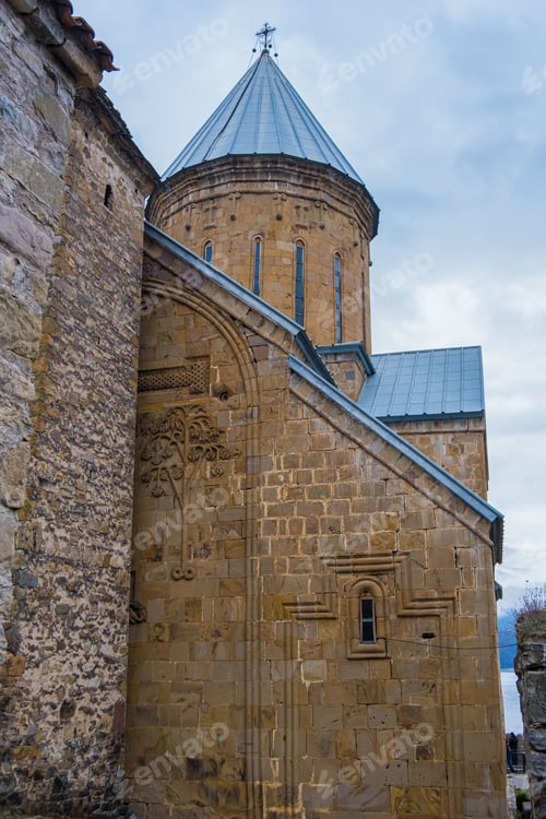 Preview: Ananuri castle complex under a cloudy sky in Georgia.