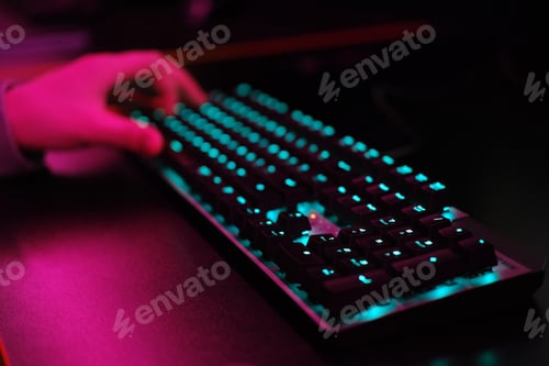 Preview: Close-up of a keyboard in neon color