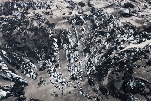 Preview: Aerial view of landscape with glacier and volcanic ash.