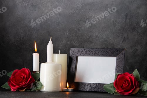 Preview: picture frame with burning candles and red flower on gray background tank death