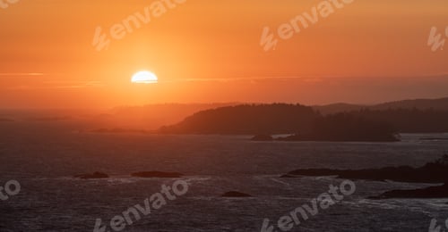 Preview: Waves on the Pacific Ocean on a rocky beach. West Coast. Sunny Summer Sunset.