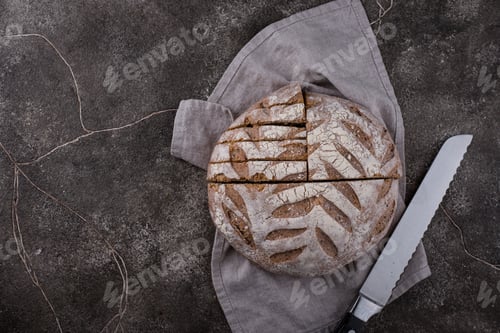 Preview: Sliced Bread on a Dark Textured Surface