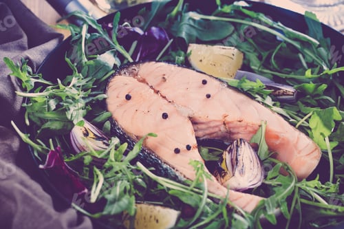 Preview: Fresh Salmon Steak with Greens and Lemon Wedges