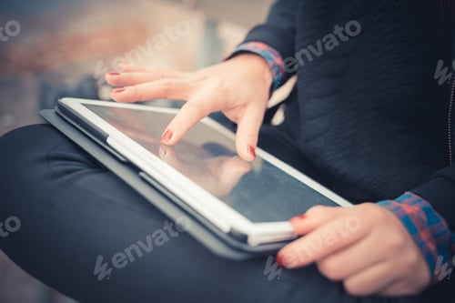 Preview: close up of hands woman using tablet