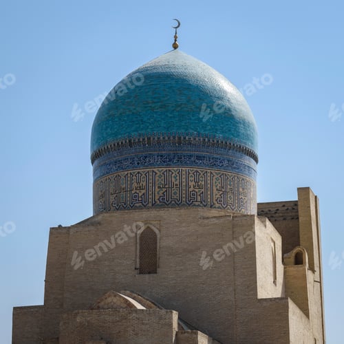 Preview: Exterior view of 16th century Po-i-Kalyan mosque with a blue tiled dome in Bukhara, a UNESCO world