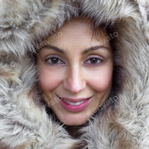 Preview: Young woman wearing furry hood
