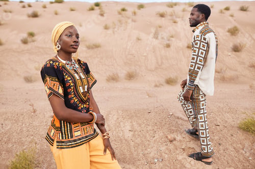 Preview: African American Couple in Traditional Clothing in Desert Setting
