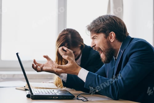 Preview: managers in the office in front of a laptop career work professionals
