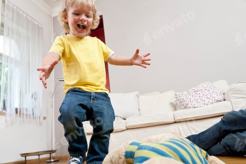 Preview: Boy jumping in living room