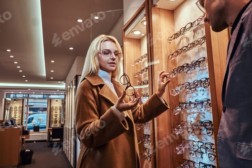Preview: Woman is choosing new frames for glasses