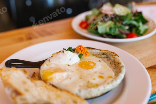 Preview: American tomorrow at the cafe. Fried eggs in a frying pan