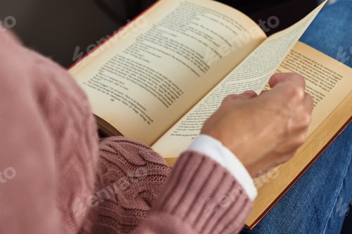 Preview: Woman sitting and reading a book. Relaxing concept