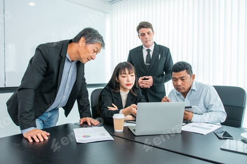 Preview: Business people team work while working in board room,