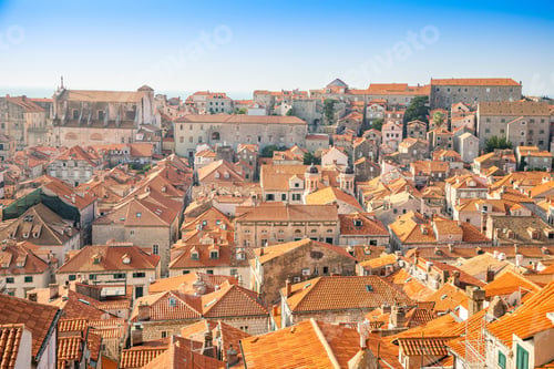 Preview: View of Dubrovnik red roofs in Croatia at sunset light, travel background
