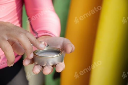 Preview: Solar surf zinc in men hand. UV protection.