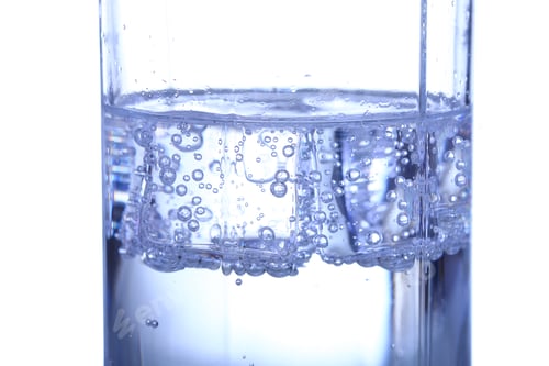 Preview: Glass of water, ice and slice of fresh lemon on a white background