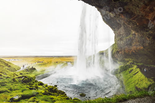 Preview: Looking at the waterfall from under the rock - Iceland