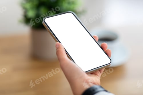 Preview: Woman hand holding phone with white blank screen