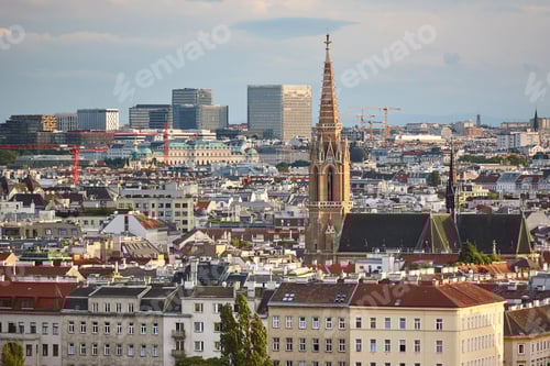 Preview: Vienna city center cityscape and St. Othmar gothic parish. Austria