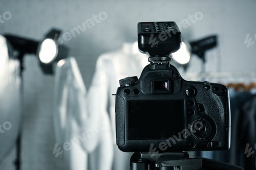 Preview: Taking pictures of ghost mannequins in professional studio, focus on camera. Fashion photography