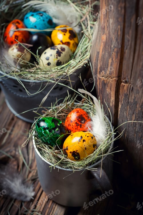 Preview: Colourfull eggs for Easter on hay on wooden background