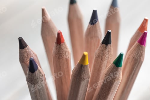 Preview: Close-up of colored pencils on a blurred background.