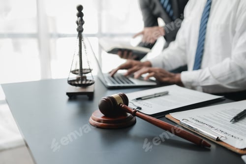 Preview: Two lawyers are meeting together to brainstorm ideas. Lawyers seek legal information together to pla