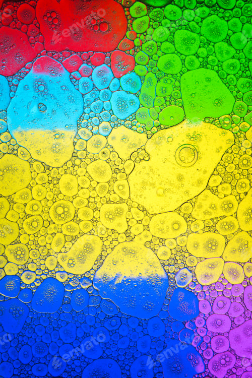 Preview: Bubbling liquid on varicolored background