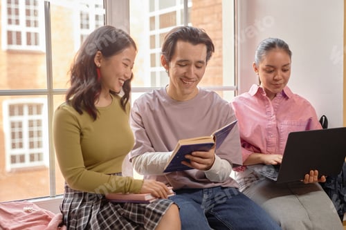 Preview: Happy College Students Cooperating in Studying on Campus