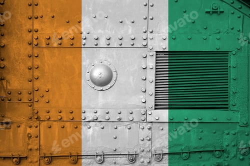 Preview: Ivory Coast flag depicted on side part of military armored tank close up