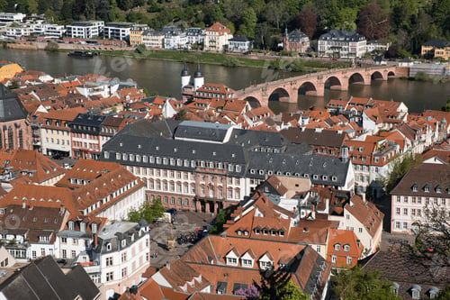Preview: Aerial view of Heidelberg's historic old town, showcasing a bridge, river, and traditional houses