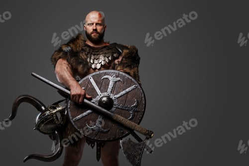 Preview: Viking man in a beard and bald head against a gray background