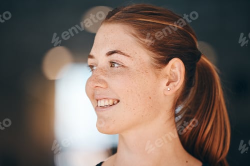 Preview: Face, freckles and thinking with a redhead woman indoor feeling happy or positive about the future.