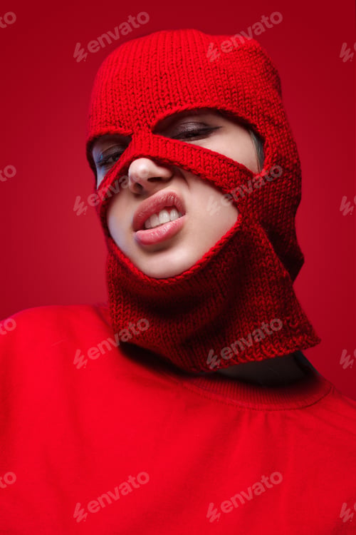 Preview: Displeased female in red mask